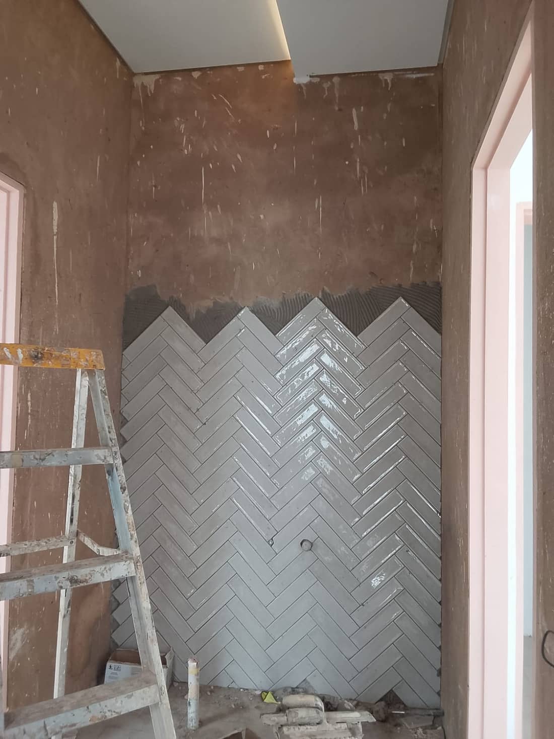 Herringbone wall tiling